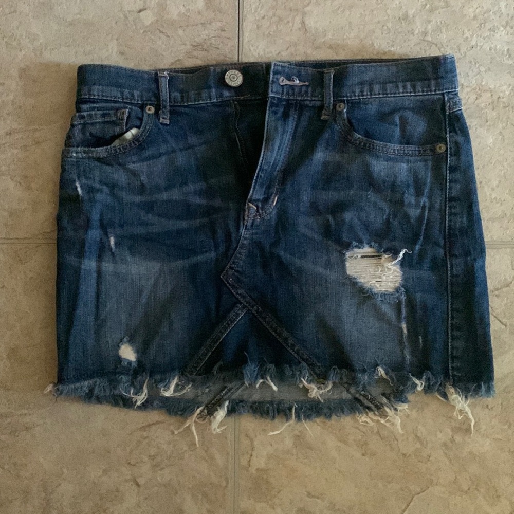 Dark wash distressed denim skirt
